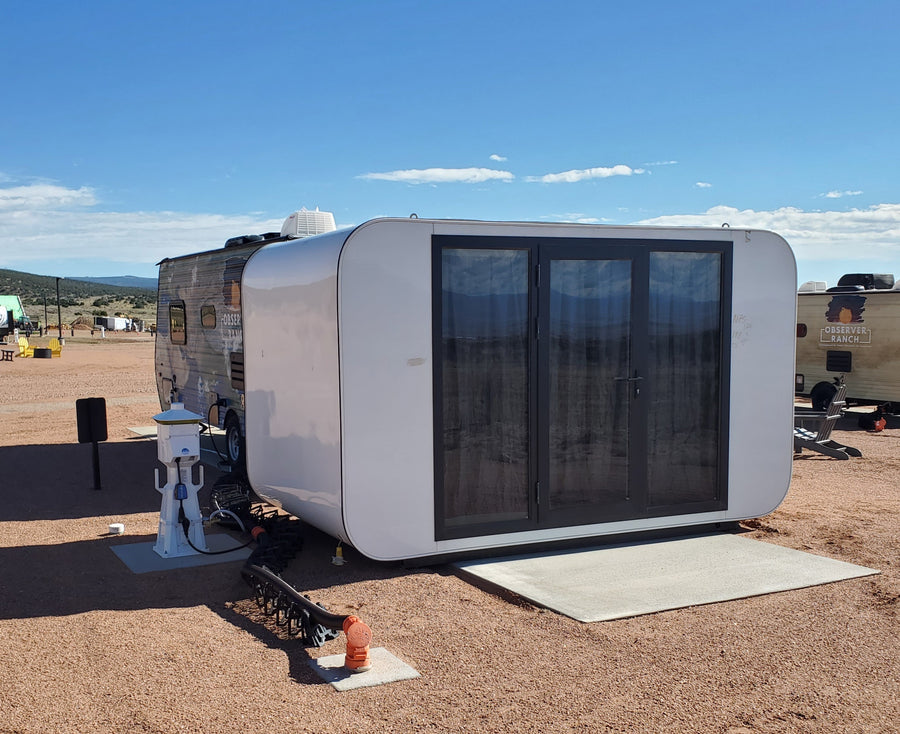Moon Pod glamping unit under the Colorado sky at Observer Ranch