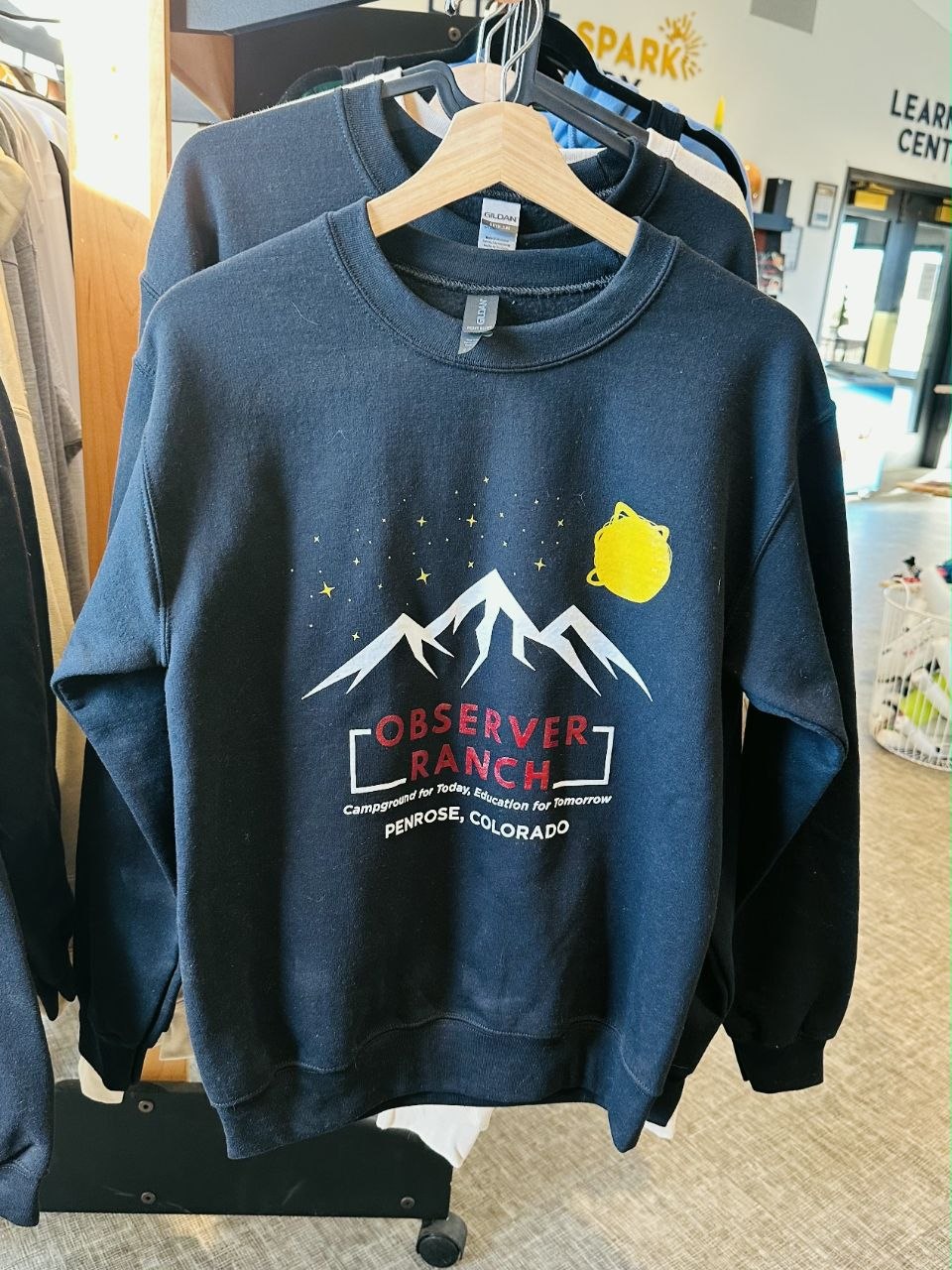 Observer Ranch navy crewneck sweatshirt with mountain logo