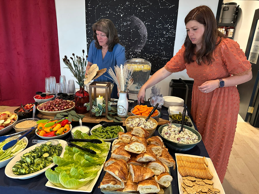 Abundant wedding buffet spread against a galaxy backdrop, Observer Ranch Penrose Colorado