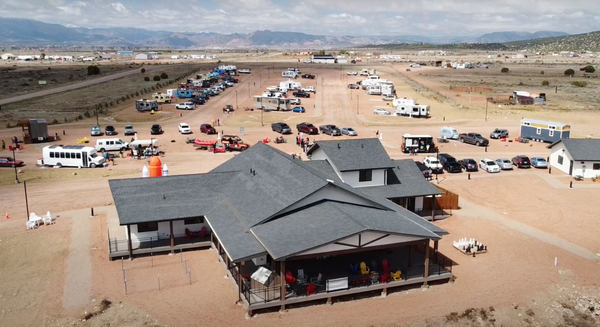Aerial view of the Observer Ranch Learning Center and grounds during an event, with guest parking and RVs across the property